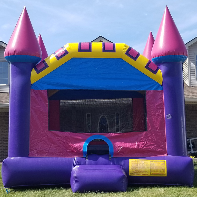 Purple, blue, and yellow inflatable castle